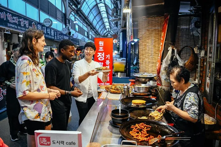 Food stalls in Namdaemun Market on a private food tasting walk, one of the seoul private tours